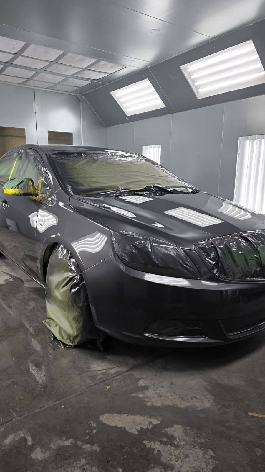 Car masked and prepped for paint at CarTech Automotive in Smyrna, TN